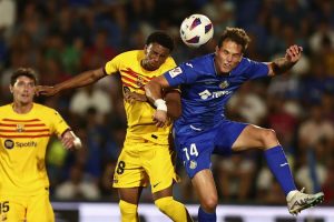 Barcelona open title defense with 0-0 draw at Getafe